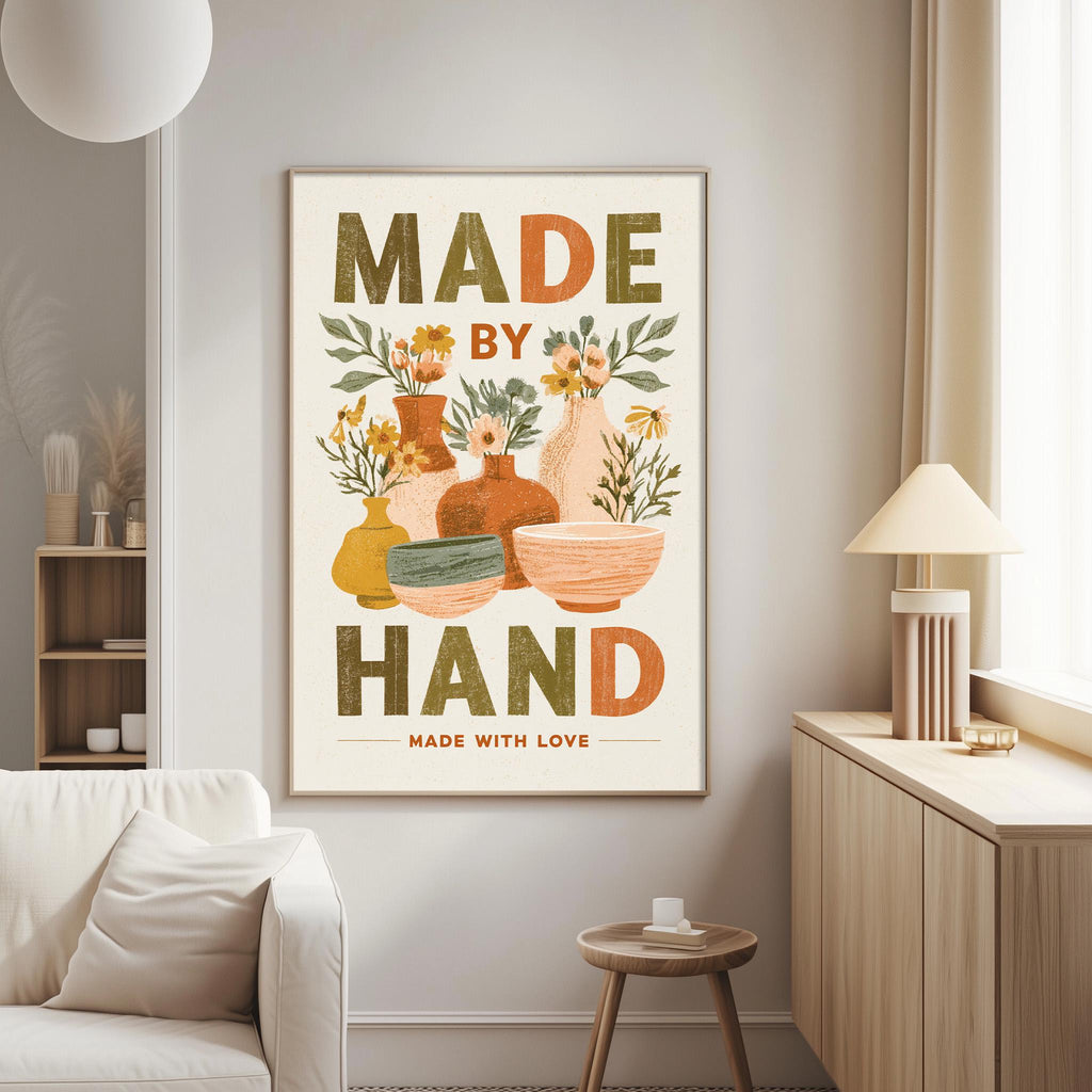a poster with the text "MADE BY HAND" and "MADE WITH LOVE" displayed on a wall in a living room setting.
