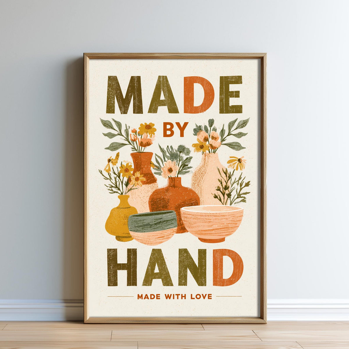 The image is a framed poster with a design featuring various vases and bowls, along with the text "MADE BY HAND MADE WITH LOVE".