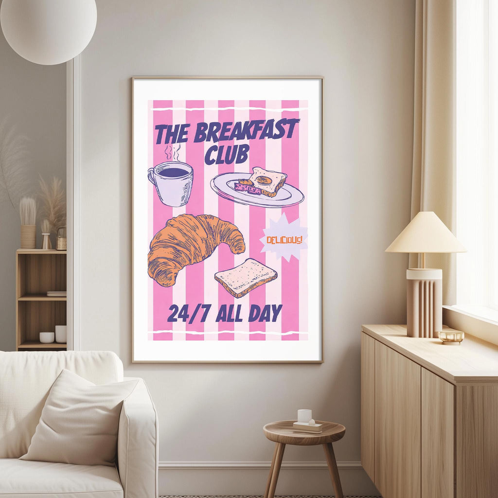 The image is a poster for "The Breakfast Club" that features various breakfast items such as a croissant, toast, and coffee.