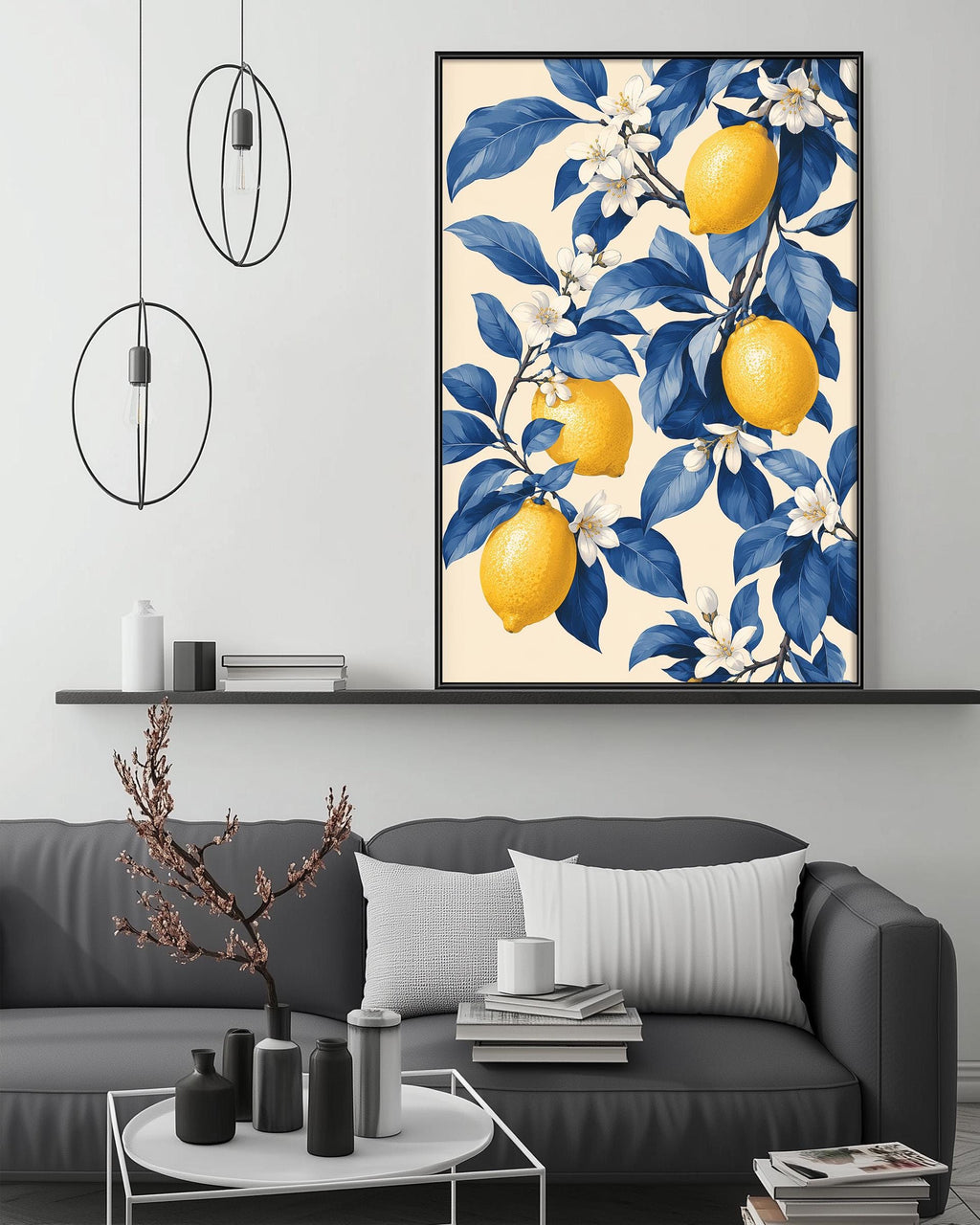 a modern living room with a gray sofa, a coffee table, and a large framed print of a lemon tree with blue leaves and yellow lemons hanging on the wall above the sofa.