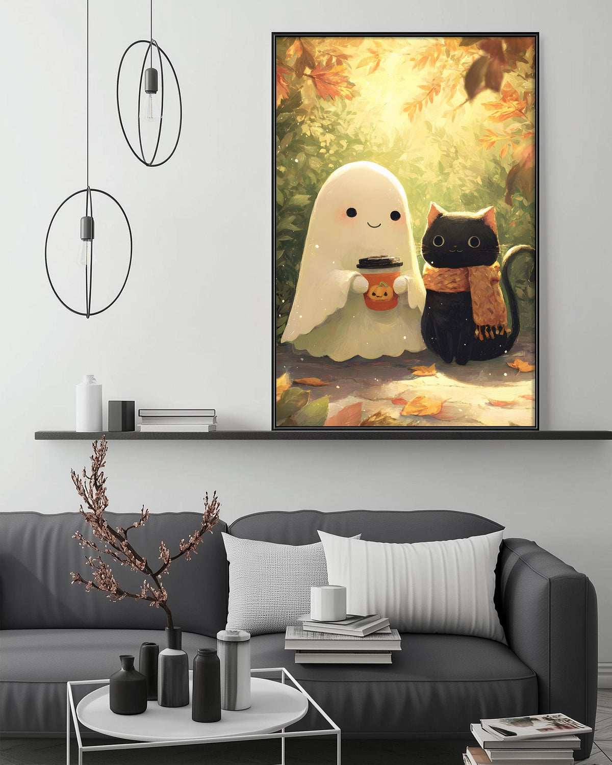 a cozy living room with a gray couch, a coffee table, and a large framed artwork depicting a ghost and a cat.