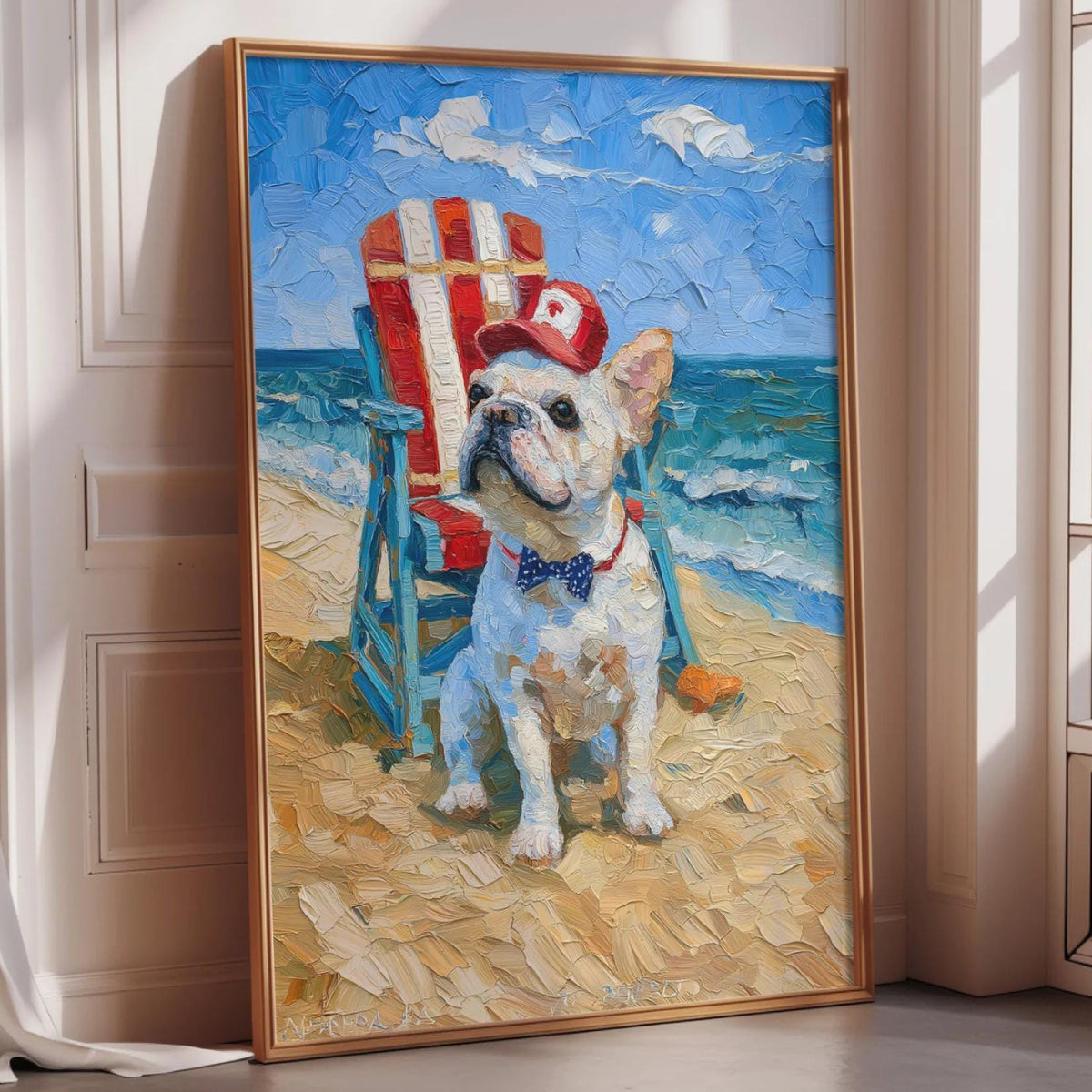 A framed painting depicting a French Bulldog sitting in a beach chair, wearing a red hat and a blue bowtie, with the ocean and sky in the background.