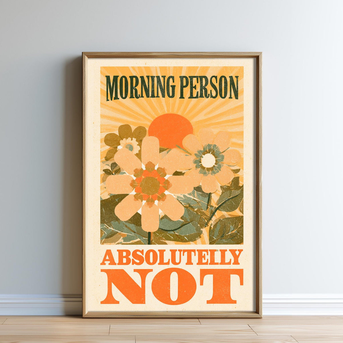The image is a framed poster with a floral design and the text "MORNING PERSON ABSOLUTELY NOT".