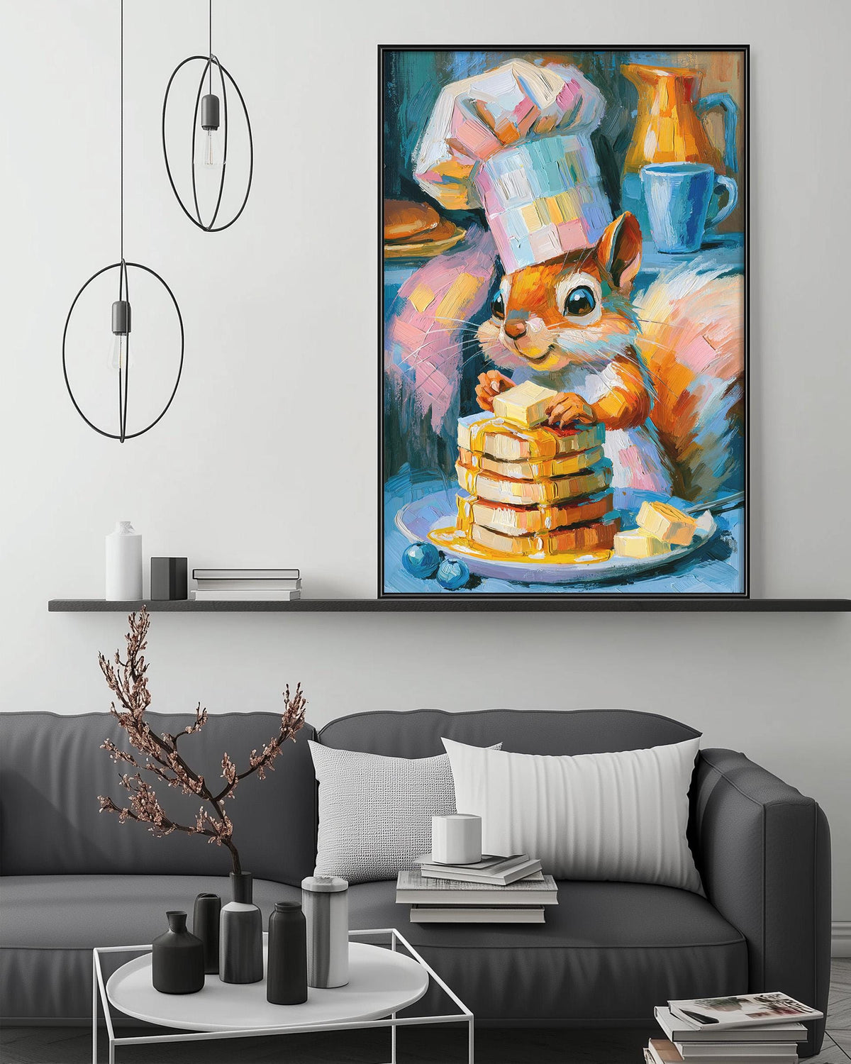 a cozy living room with a gray couch, a coffee table, and a painting of a squirrel wearing a chef's hat and holding a stack of pancakes.