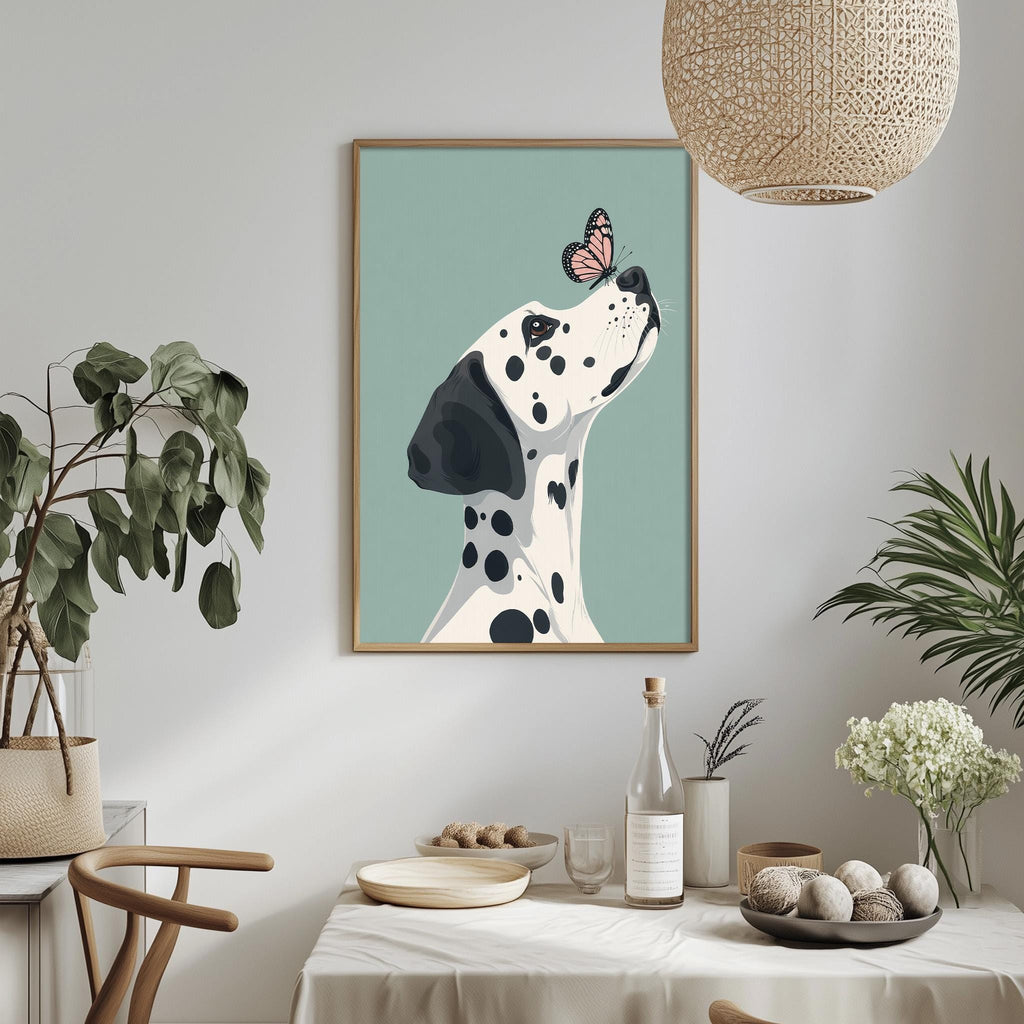 a framed illustration of a Dalmatian dog with a butterfly on its nose, hanging on a wall above a dining table with various decorative items and plants.