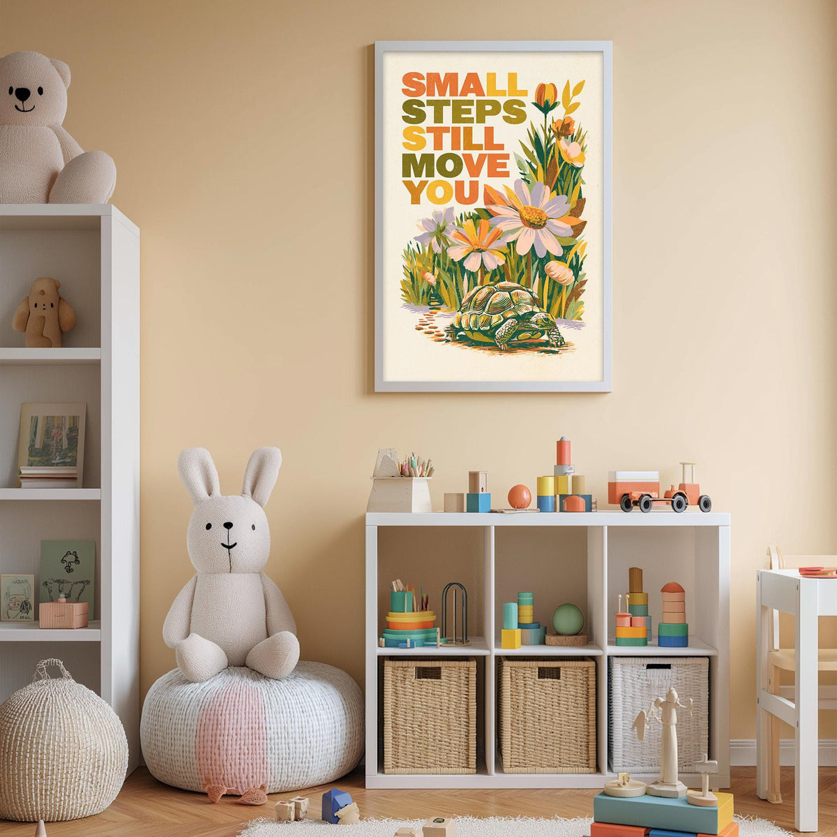 a child's bedroom with a white bookshelf, a stuffed rabbit, a toy train, and a framed poster with a floral design.