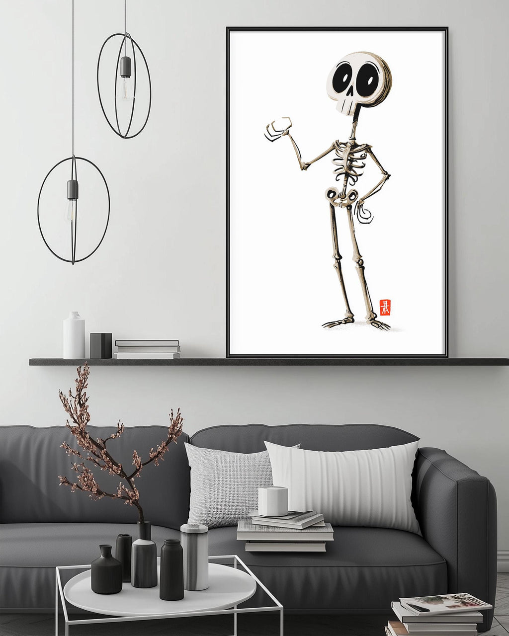 a modern living room with a gray sofa, a coffee table, and a large framed artwork of a skeleton character on the wall.