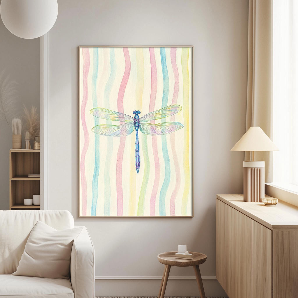 a living room with a white couch, a wooden side table, and a framed artwork of a colorful dragonfly hanging on the wall.