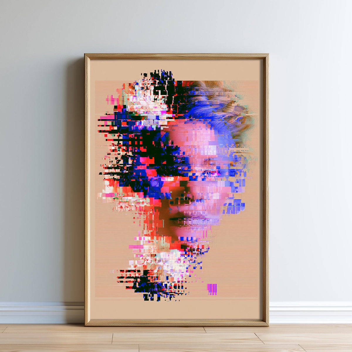 The image is a framed artwork depicting a colorful, abstract face with a distorted, pixelated effect.