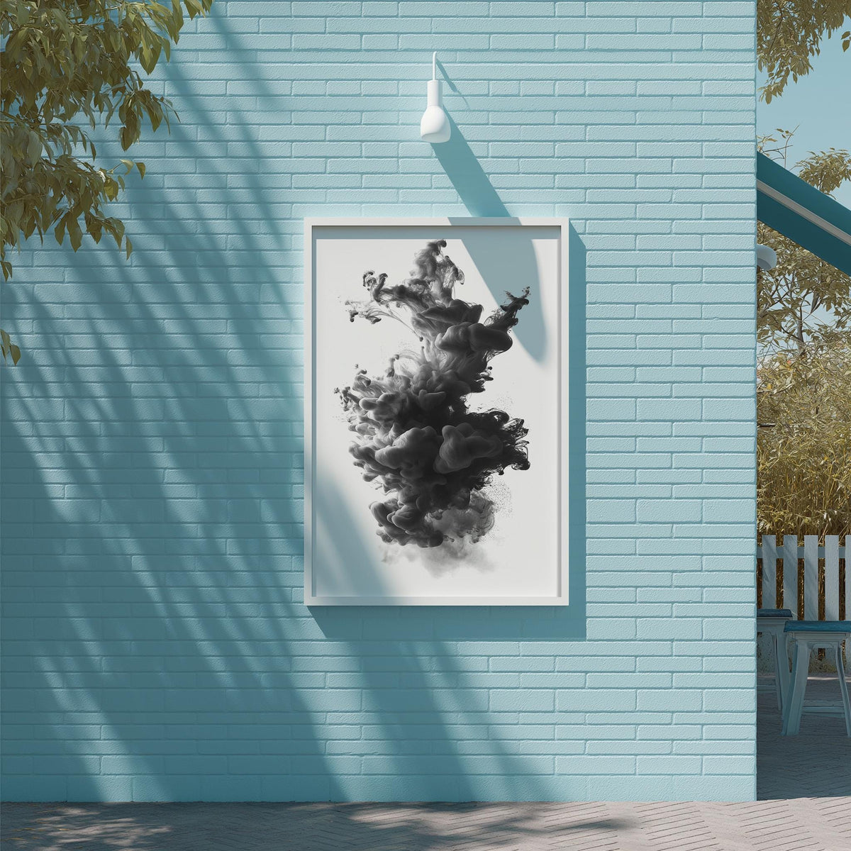 a blue brick wall with a framed black and white abstract artwork hanging on it.