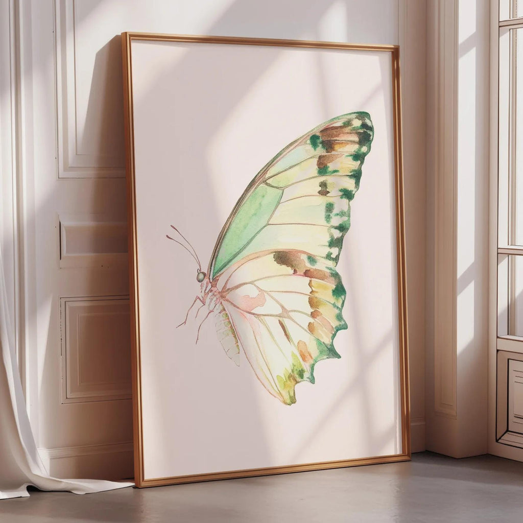 A framed watercolor painting of a colorful butterfly is displayed on a wall in a room with sunlight streaming in through a window.