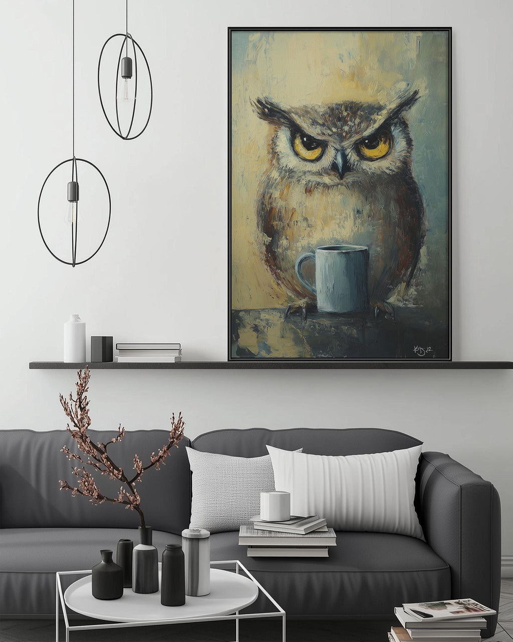 a large painting of an owl holding a cup, hanging on a wall above a gray couch with white pillows. The painting is surrounded by various decorative items, such as a potted plant, vases, and books, creating a cozy and stylish living room setting.