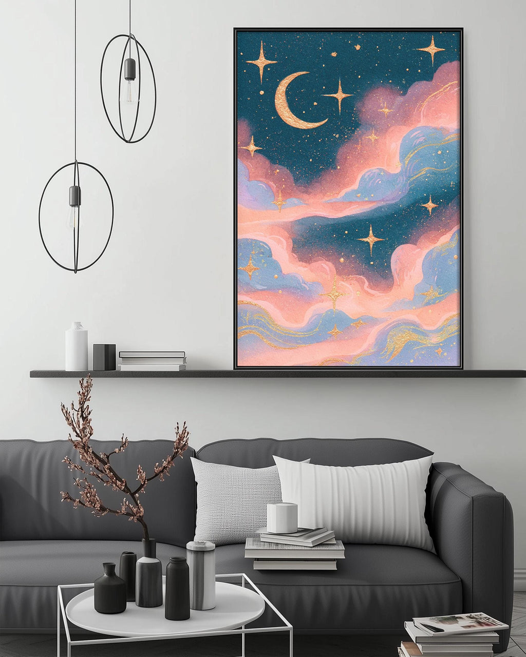 a large, colorful painting of a night sky with stars and a crescent moon, hanging on a wall above a gray couch with white pillows. The painting is framed in black and is the focal point of the room.