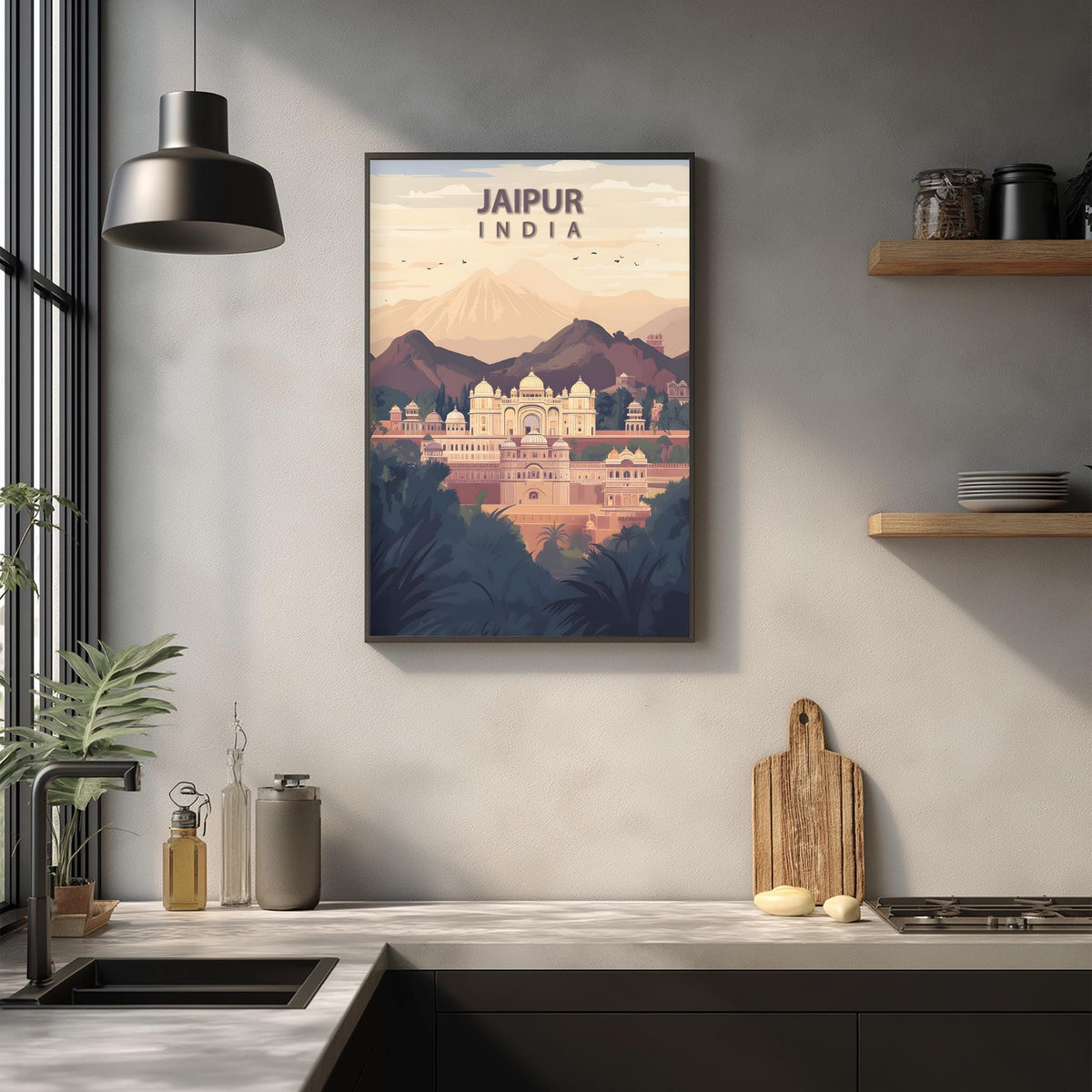 a framed poster of Jaipur, India, hanging on a wall in a kitchen setting.