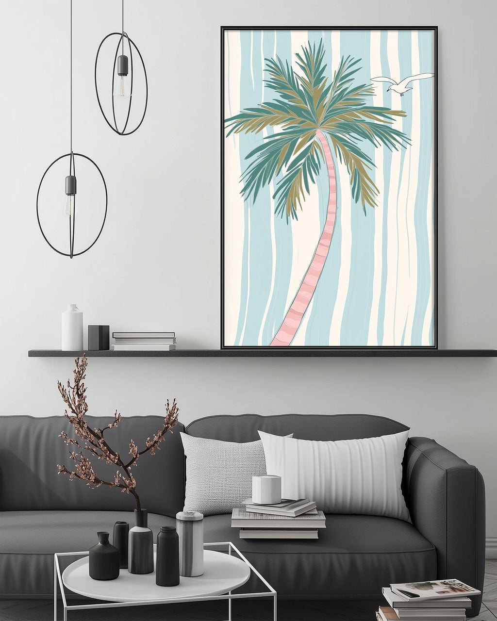 a modern living room with a gray sofa, a coffee table, and a large framed artwork of a palm tree on the wall.