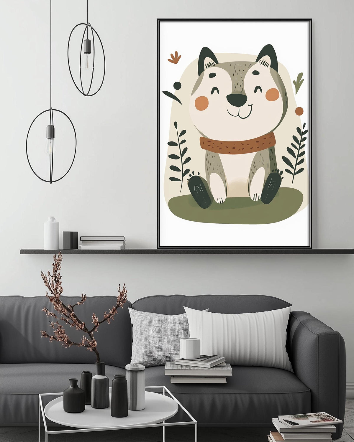 a cozy living room with a gray couch, a coffee table, and a framed illustration of a smiling cat on the wall above the couch.
