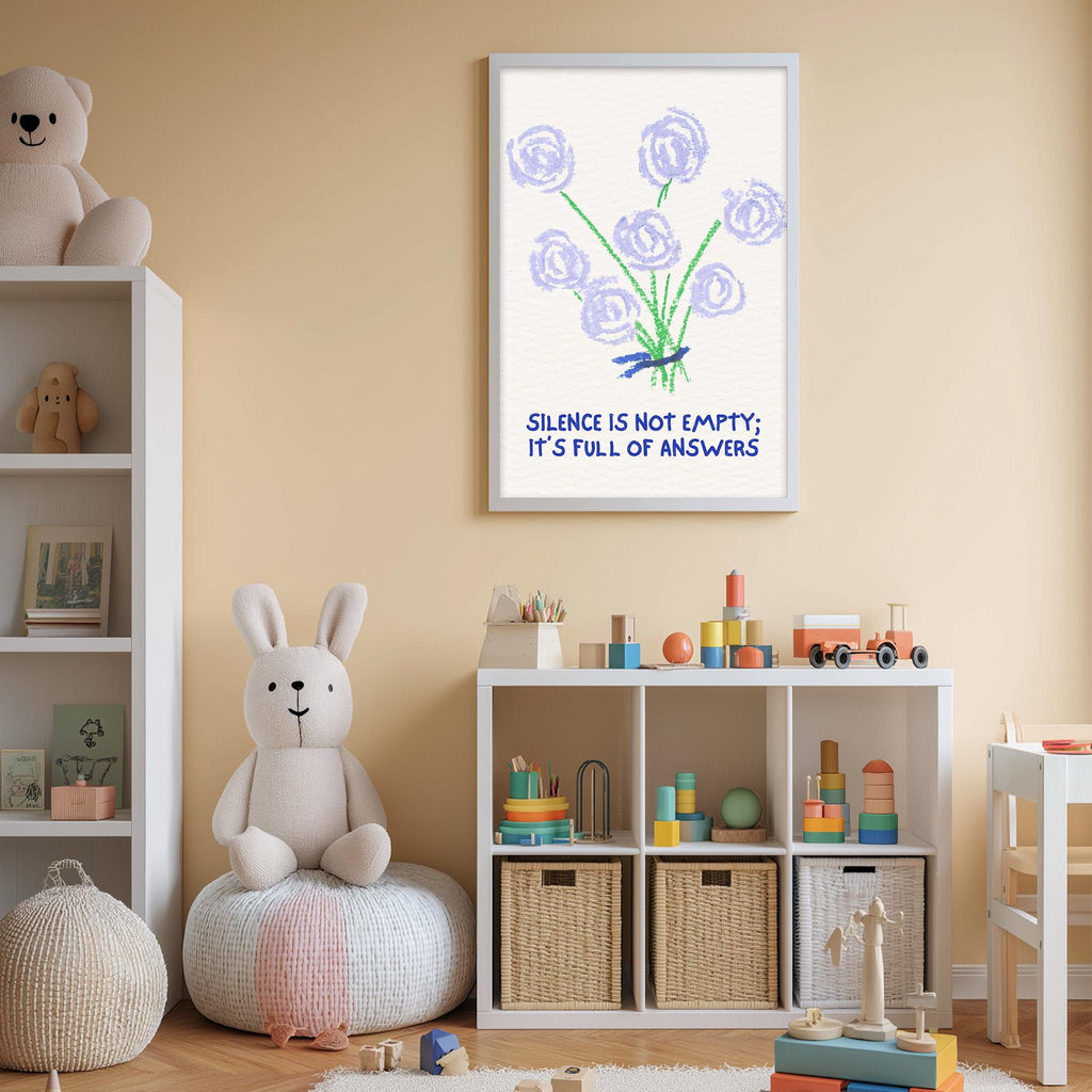 A child's bedroom with a white bookshelf, a stuffed rabbit, and a framed poster with a flower design and the text "Silence is not empty. It's full of answers".