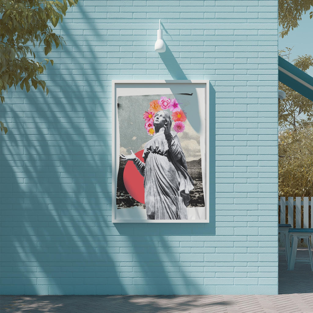 a framed artwork of a woman with a floral headpiece, displayed on a blue brick wall.