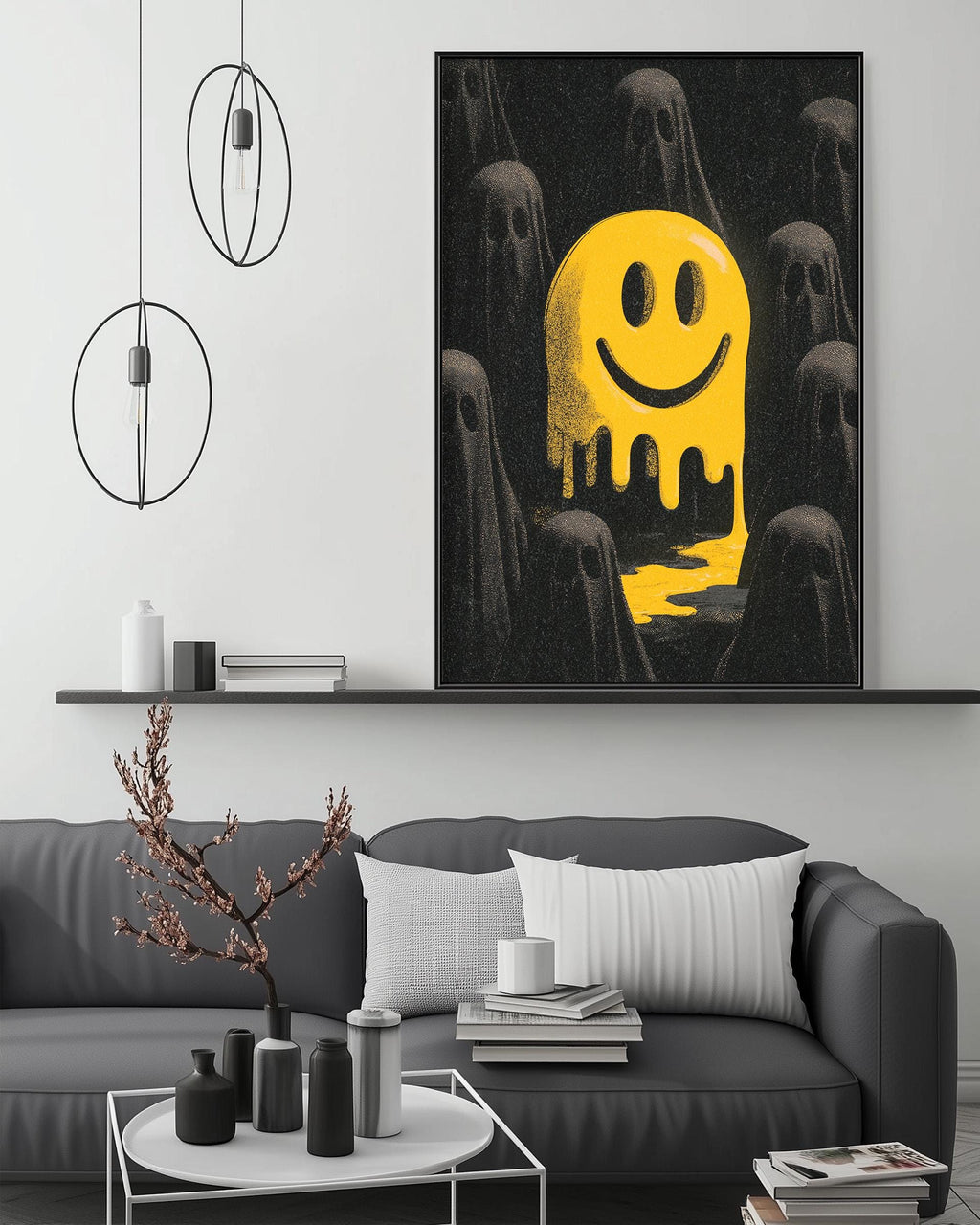a modern living room with a gray sofa, a coffee table, and a large framed artwork depicting a yellow smiley face surrounded by black ghostly figures.