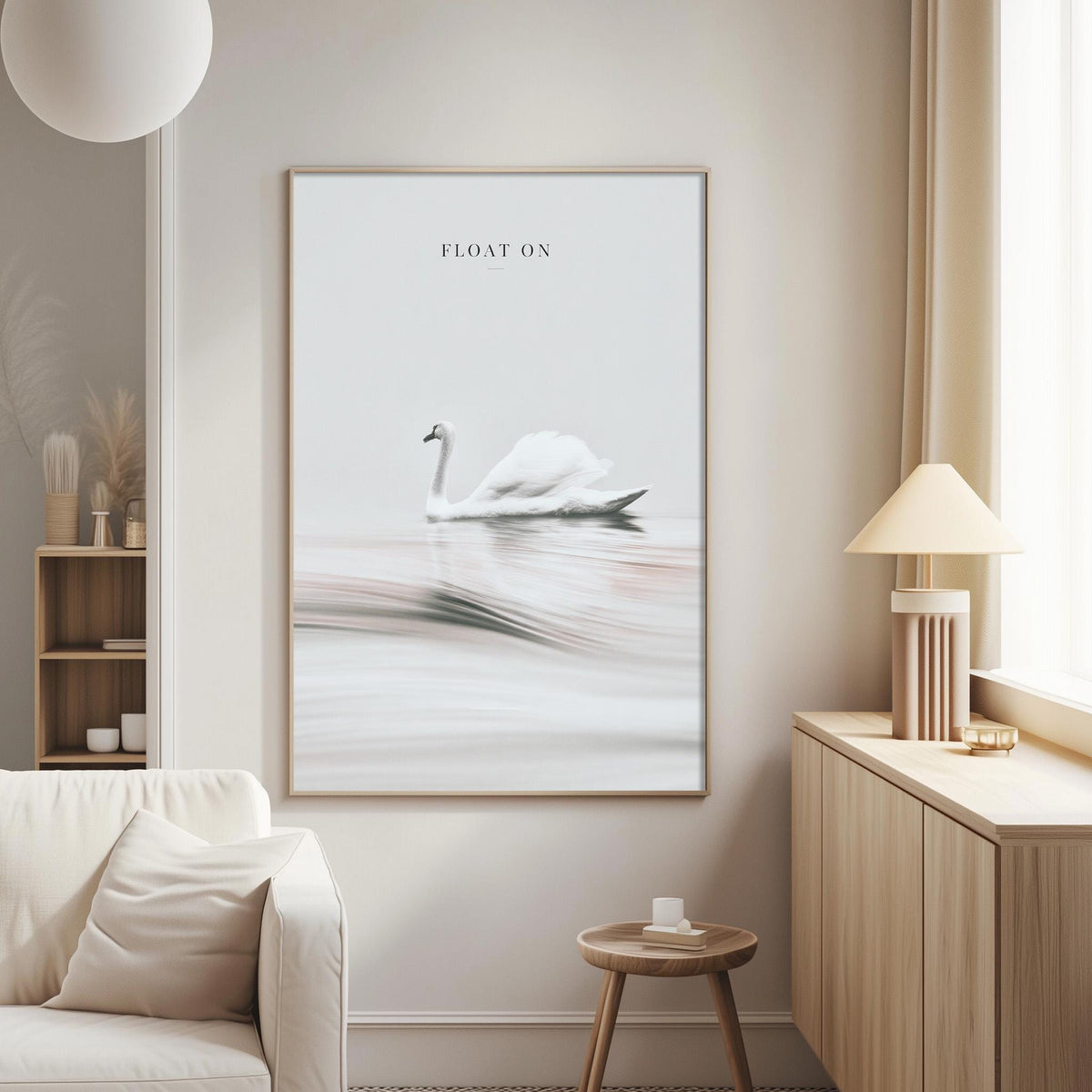 a large framed picture of a swan swimming on a lake, hanging on a wall in a living room.