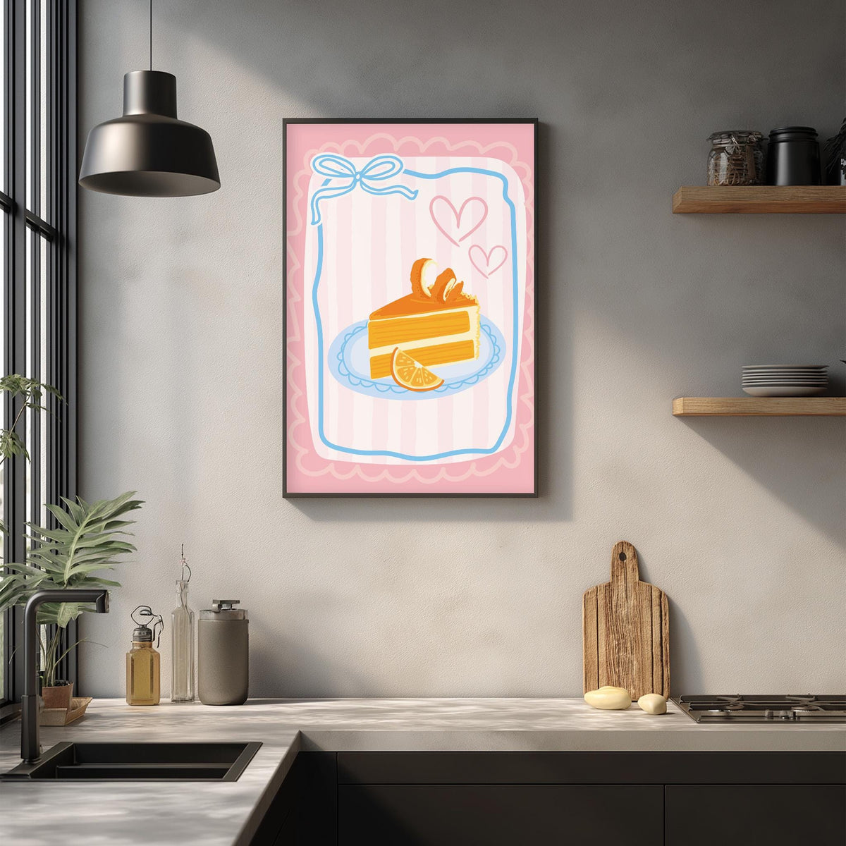 a kitchen scene with a framed illustration of a slice of cake on a pink and blue striped background, hanging on a wall above a kitchen counter.