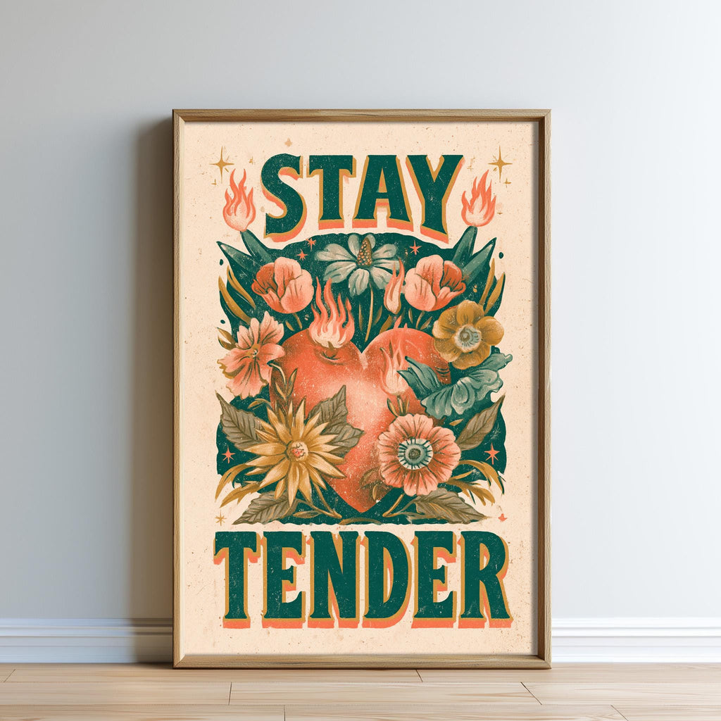 The image is a framed poster with a floral design and the text "STAY TENDER" prominently displayed.