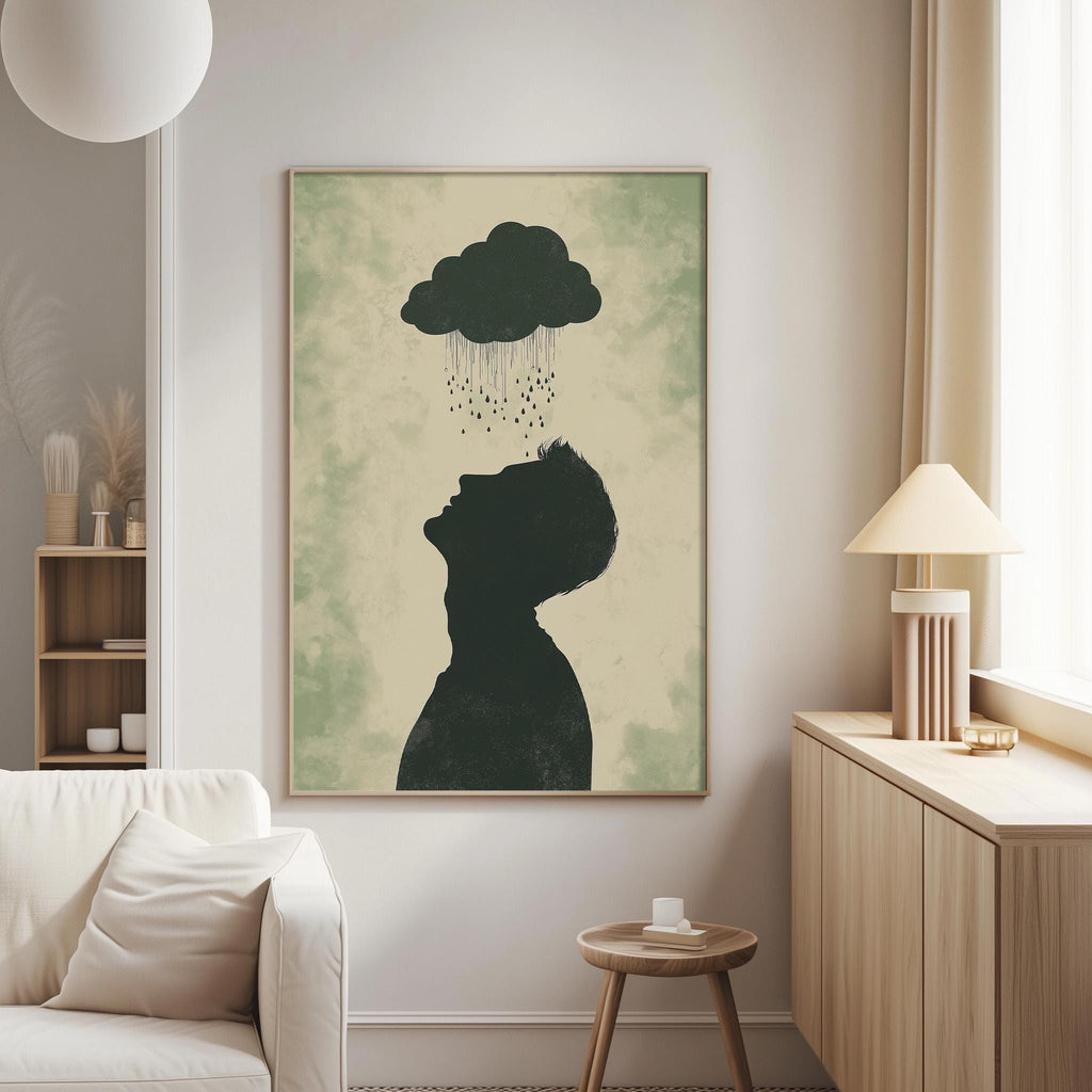 a living room with a large framed artwork hanging on the wall, depicting a silhouette of a person with a cloud above their head.