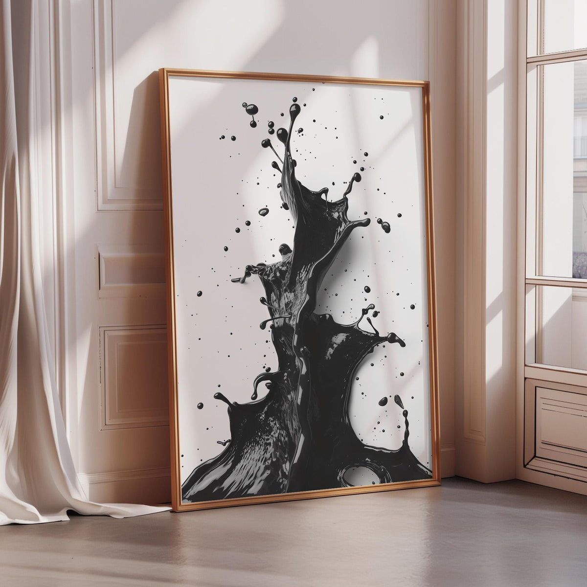 a large, framed artwork depicting a splash of black liquid, with splashes and droplets scattered across the frame.