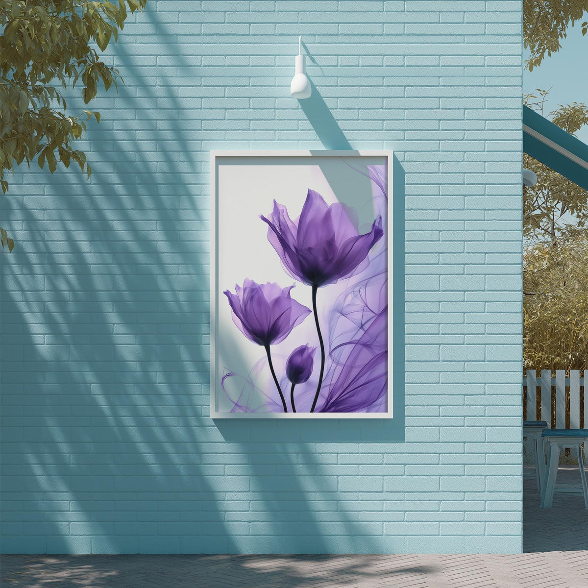 a blue brick wall with a framed picture of purple flowers hanging on it.