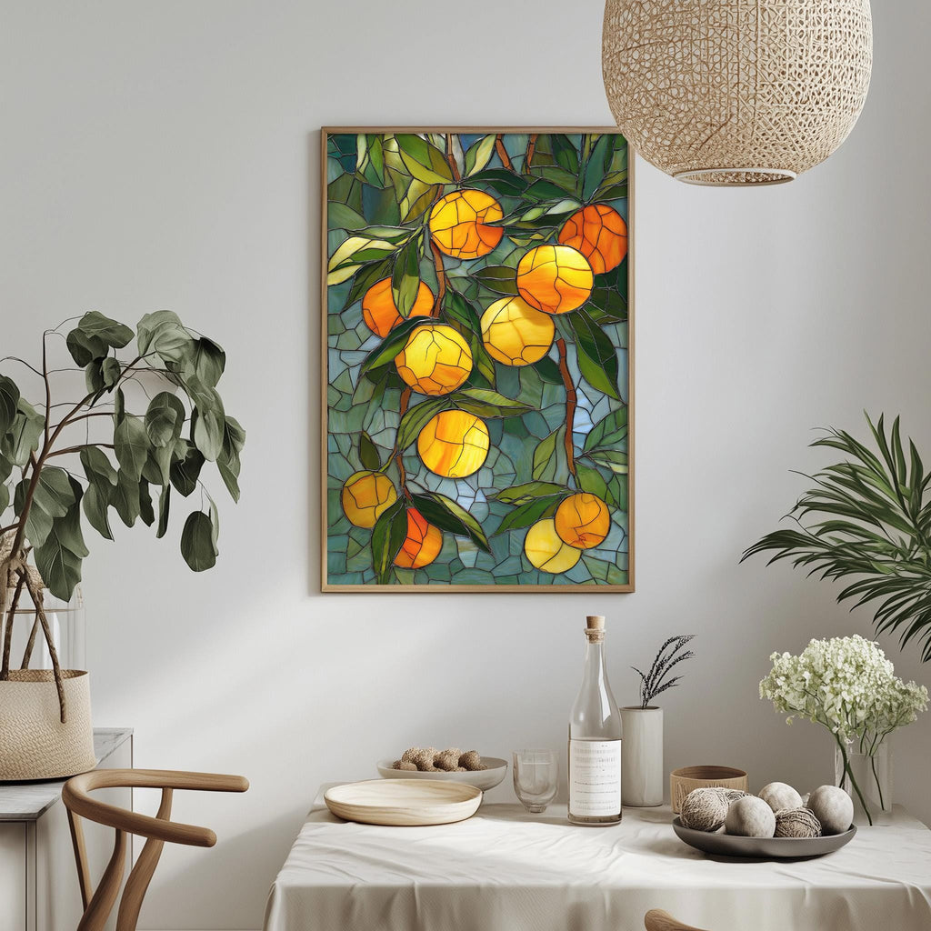 a dining table with a white tablecloth, a bowl of fruit, a bottle, and a vase with flowers. Above the table, there is a framed painting of a tree with oranges hanging from its branches.