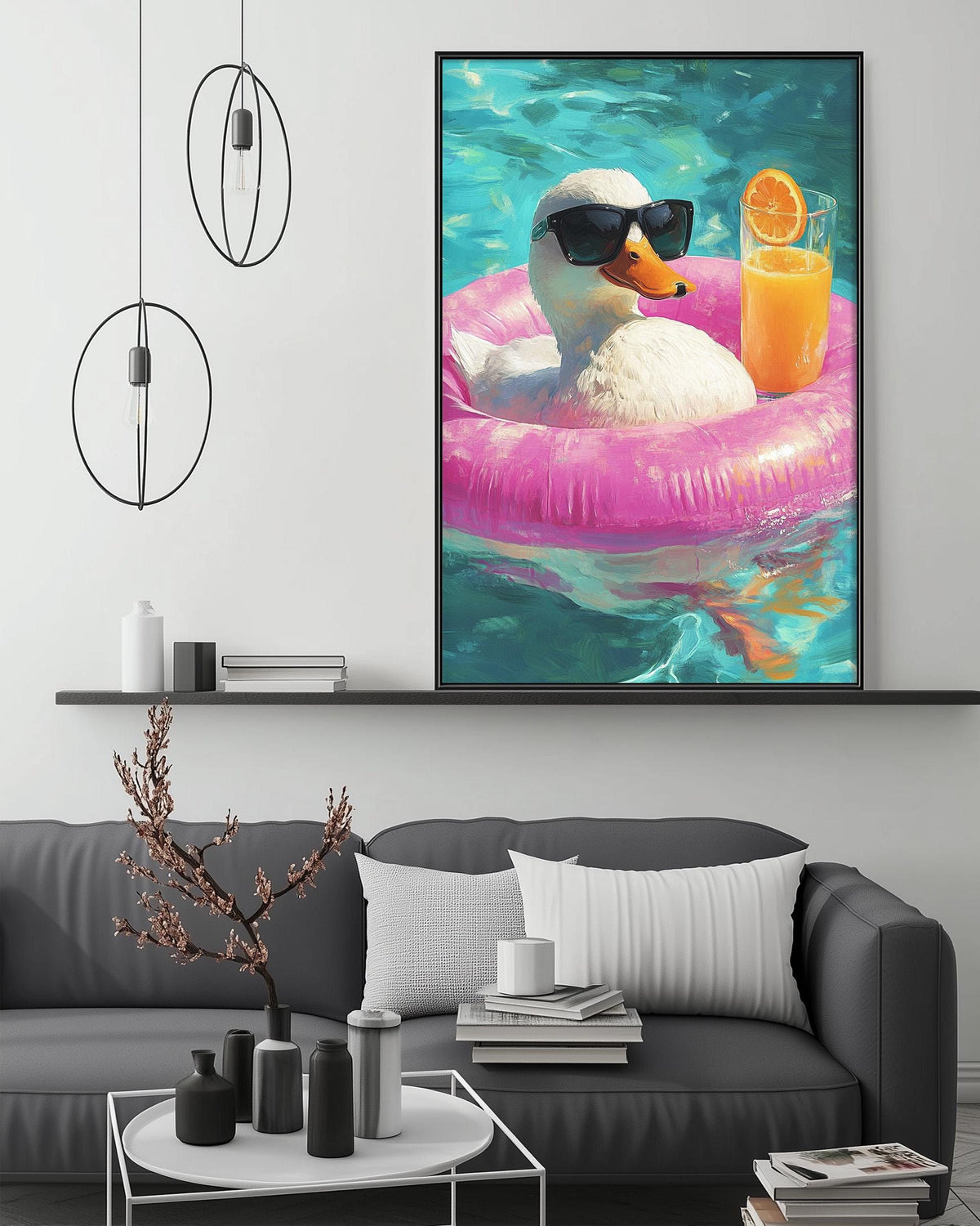 A large framed painting depicting a duck wearing sunglasses and floating on a pink inner tube in a pool, with a glass of orange juice nearby.