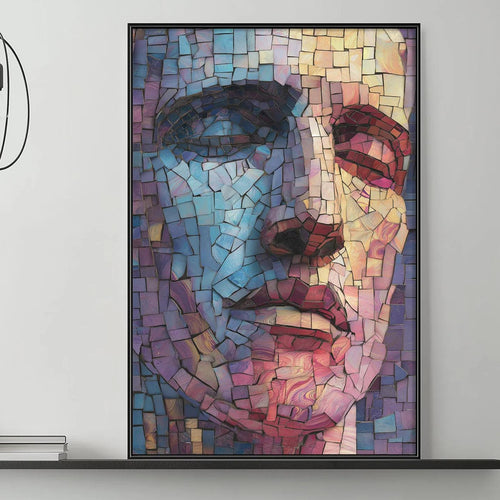 a modern living room with a gray sofa, a coffee table, and a large framed mosaic portrait of a man's face hanging on the wall above the sofa.