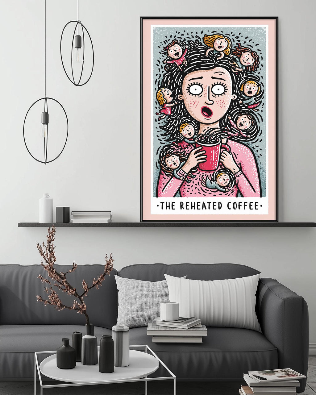 a cozy living room with a gray couch, a coffee table, and a large framed poster of a woman with a surprised expression. The poster also includes the text "The reheated coffee".