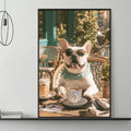 A framed photograph of a French Bulldog wearing sunglasses and sitting at a table with a cup and saucer, surrounded by a cozy, stylish living room setting.