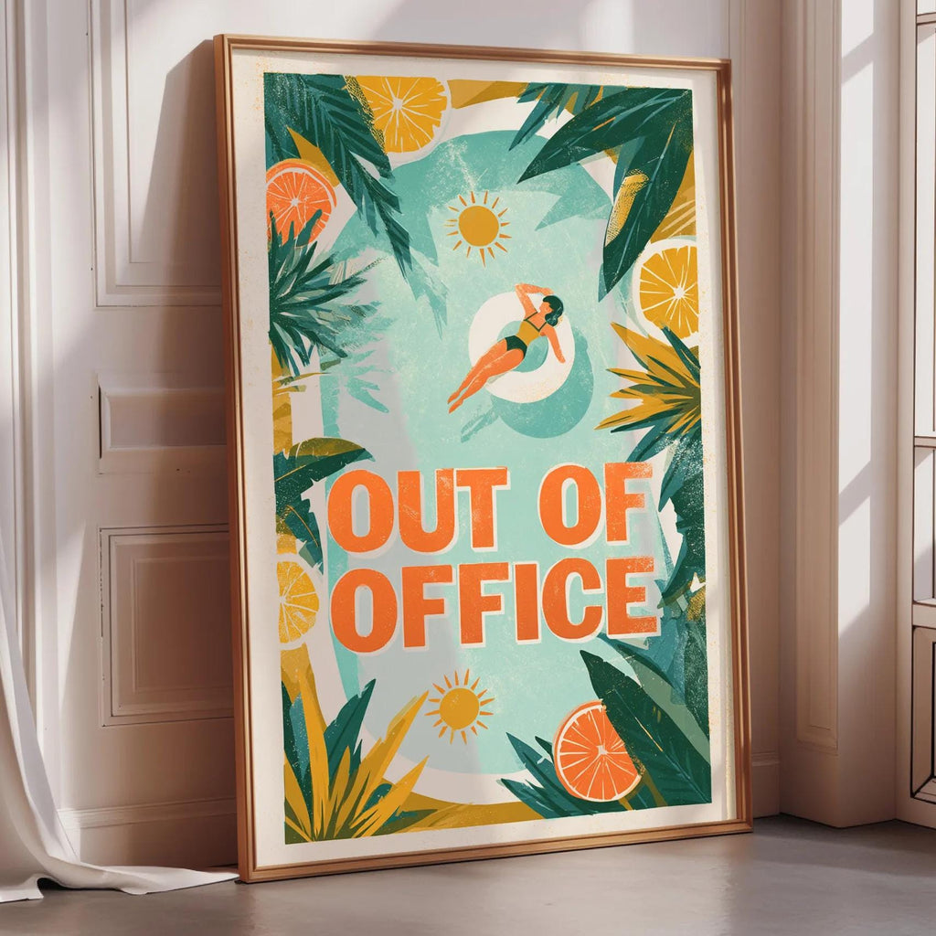 a framed poster with a tropical design, including palm trees, flowers, and a woman swimming in a pool. The poster has a bold, colorful design with the text "OUT OF OFFICE" prominently displayed.