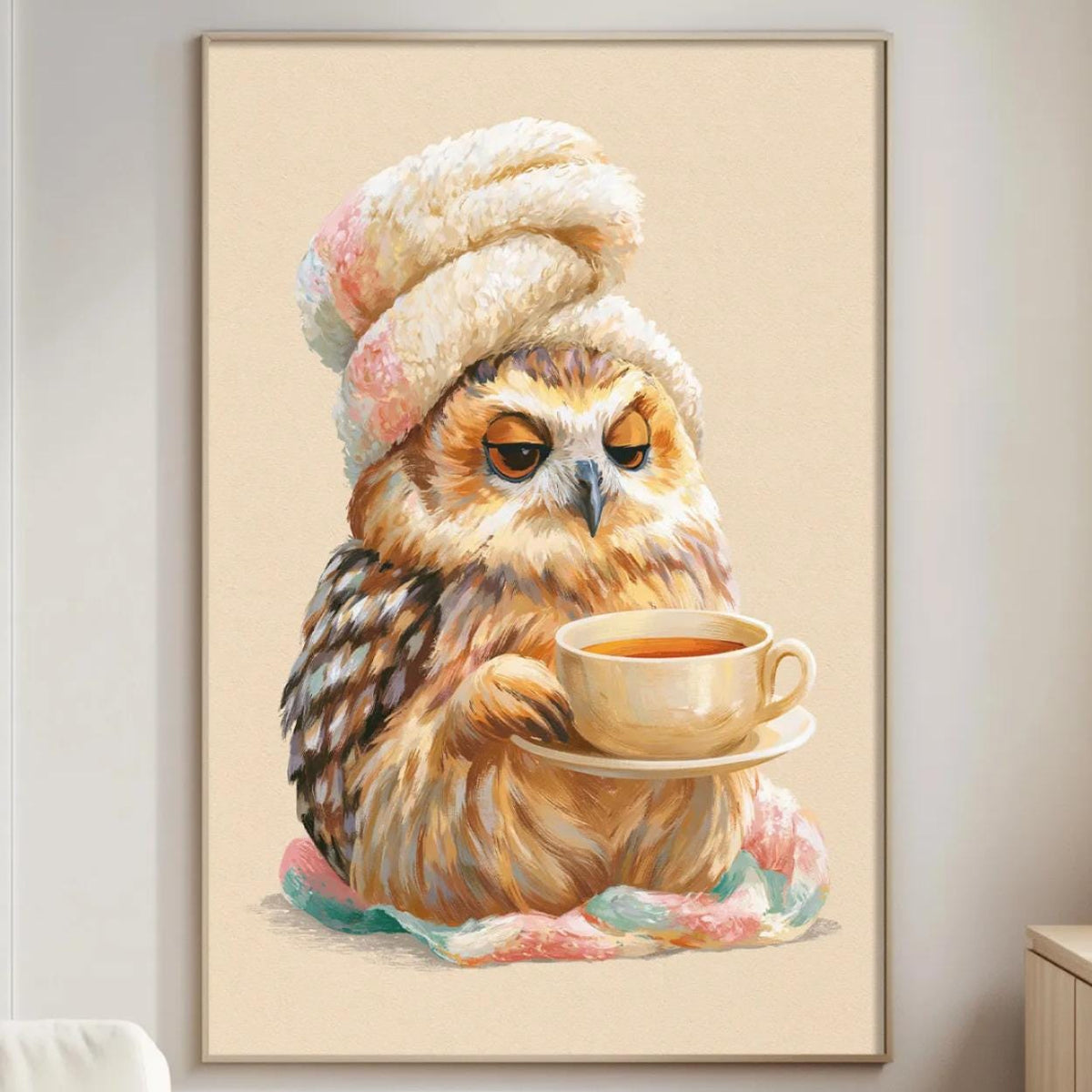 A cozy living room with a large framed painting of an owl wearing a hat and holding a cup of tea, sitting on a bed with a blanket.