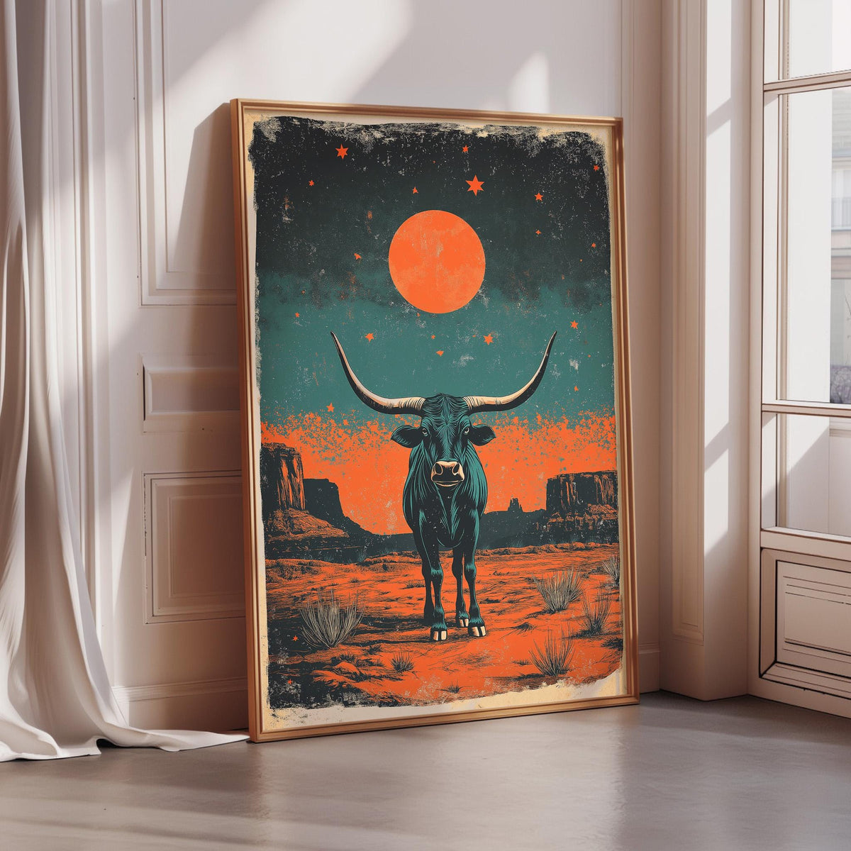 a large framed artwork depicting a bull with horns and a starry night sky in the background.
