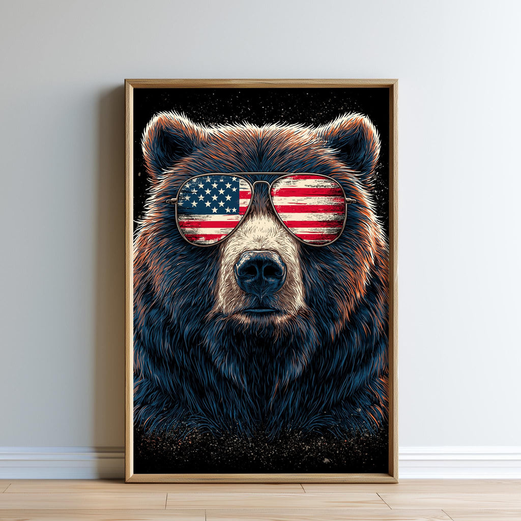 A framed poster depicting a bear wearing sunglasses with an American flag pattern on the lenses.