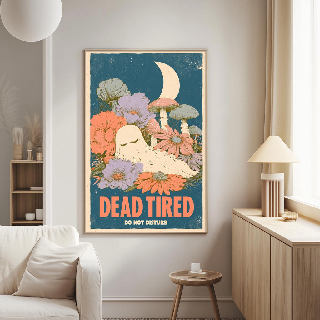 a poster with a whimsical illustration of a sleeping ghost surrounded by flowers and mushrooms, with the text "DEAD TIRED DO NOT DISTURB" displayed prominently.