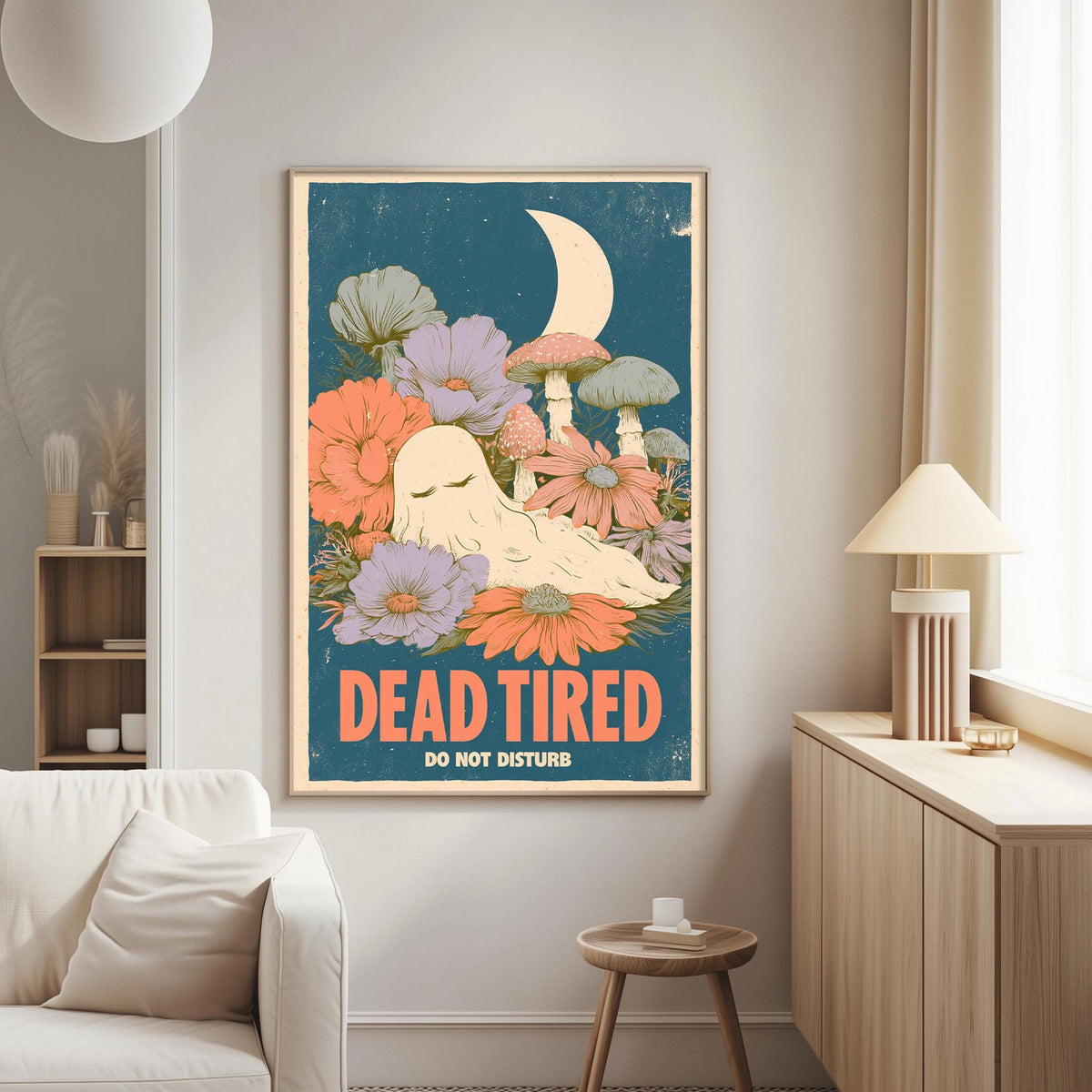 a poster with a whimsical illustration of a sleeping ghost surrounded by flowers and mushrooms, with the text "DEAD TIRED DO NOT DISTURB" displayed prominently.