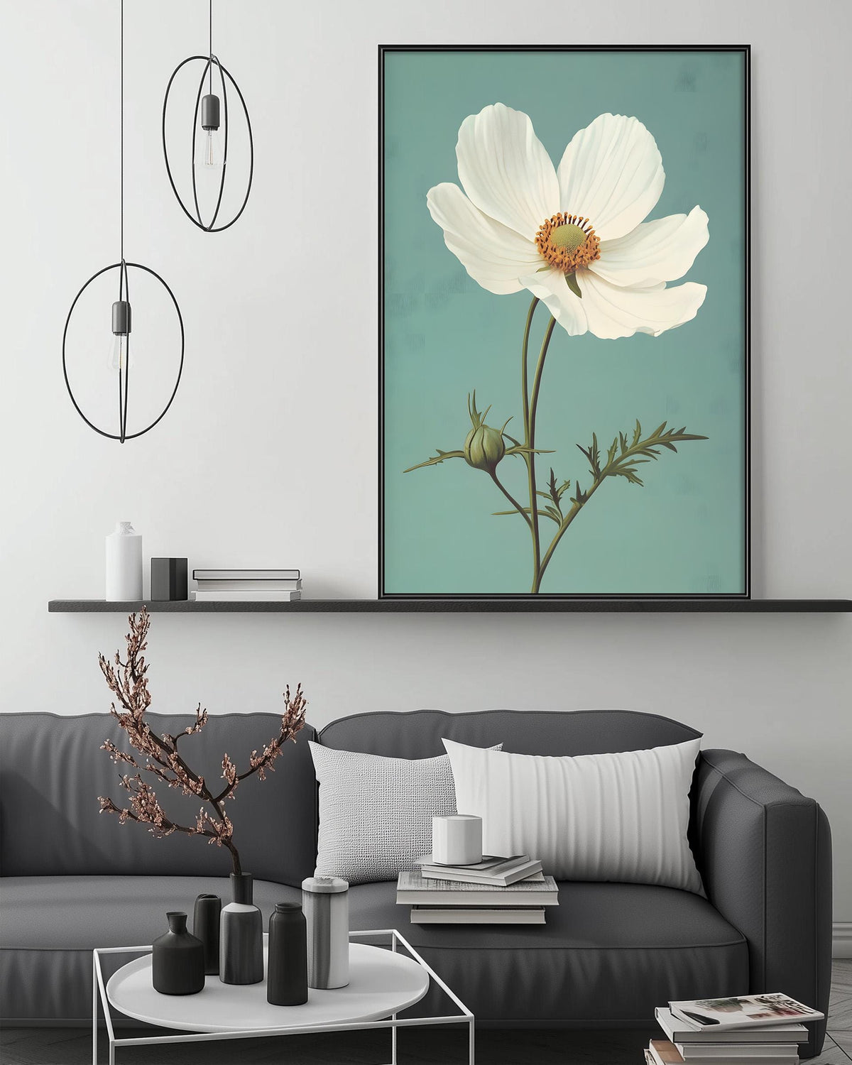 a modern living room with a gray sofa, a coffee table, and a large framed artwork of a white flower on the wall.