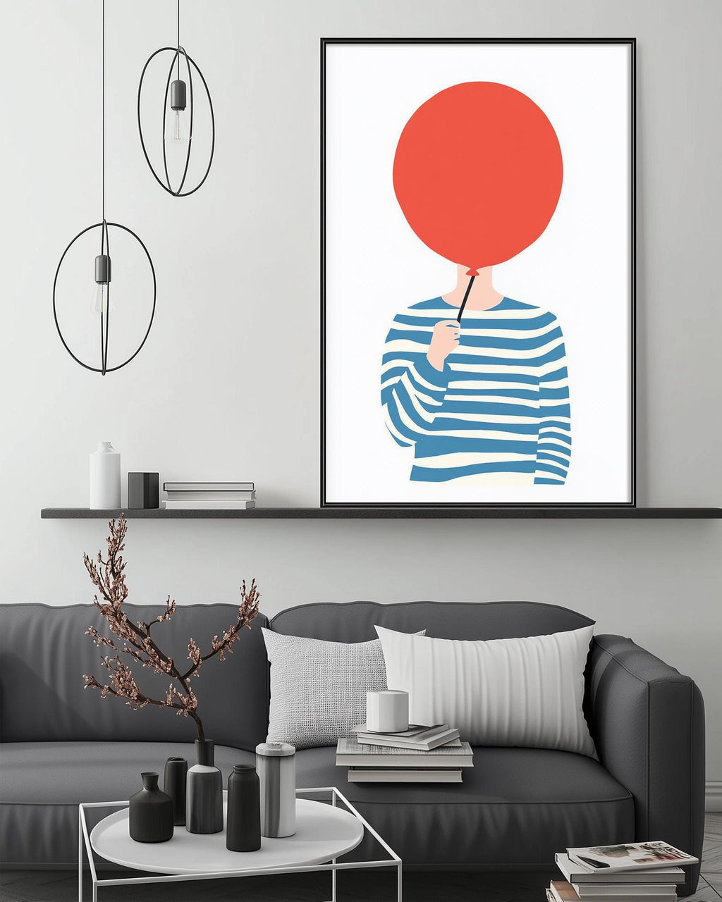 a modern living room with a gray sofa, a coffee table, and a framed artwork depicting a person holding a red balloon.
