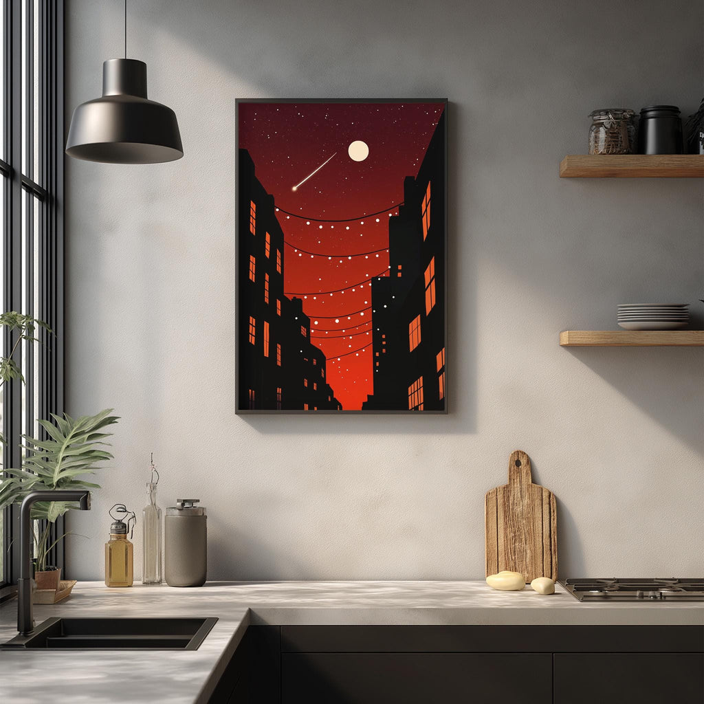 a kitchen counter with various kitchen items, such as a cutting board, a sink, and a potted plant. Above the counter, there is a framed artwork depicting a cityscape at night with a full moon and a string of lights.