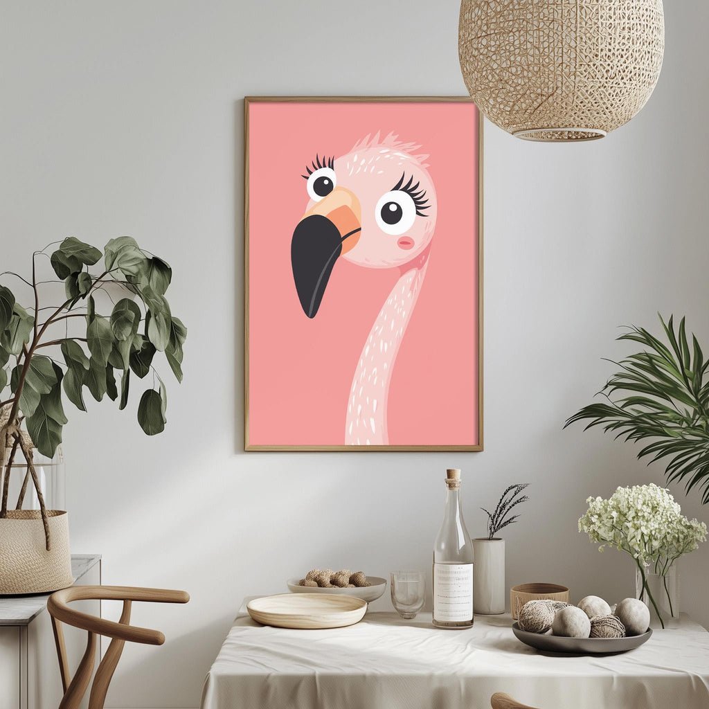 a pink flamingo with a pink background and a wooden frame, hanging on a wall above a dining table with various decorative items and plants.