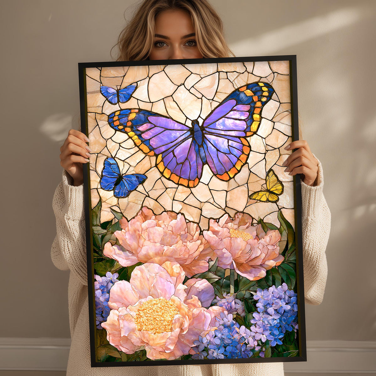 A woman holds up a framed stained glass artwork depicting a vibrant butterfly surrounded by colorful flowers.