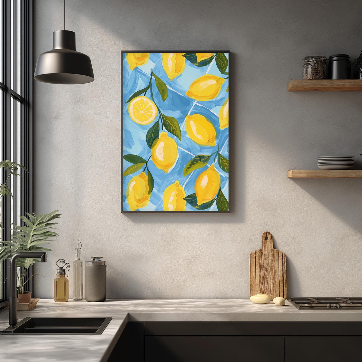 a kitchen counter with a framed painting of lemons hanging on the wall above it. The painting has a vibrant blue background with yellow lemons and green leaves. The kitchen counter has various items on it, including a cutting board, a bottle, and a bowl.
