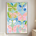 a large, colorful painting of butterflies hanging on a wall in a living room.
