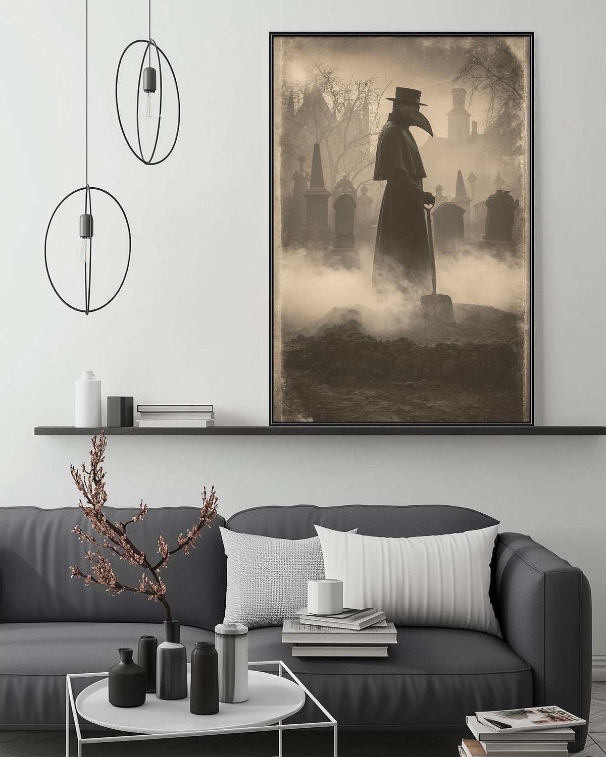 a large framed picture of a person wearing a mask and holding a shovel, standing in a foggy graveyard. The picture is hanging on a wall above a gray couch with a coffee table in front of it.