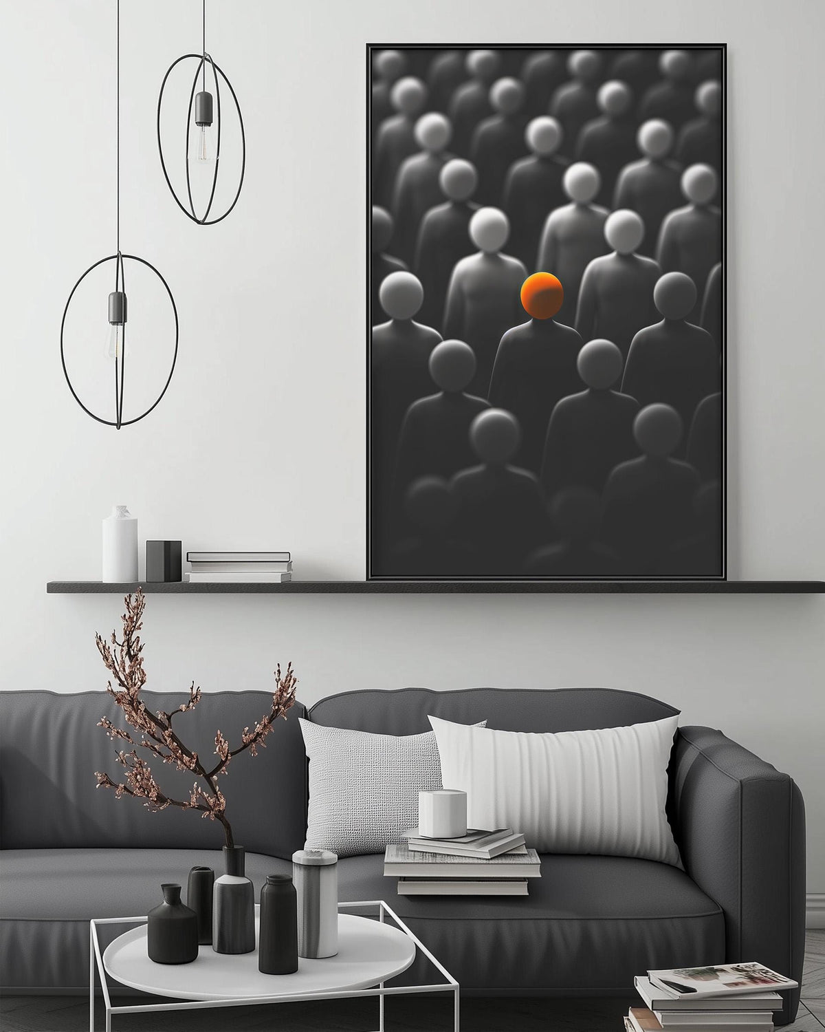 a modern living room with a gray sofa, a coffee table, and a large black and white abstract painting hanging on the wall above the sofa.