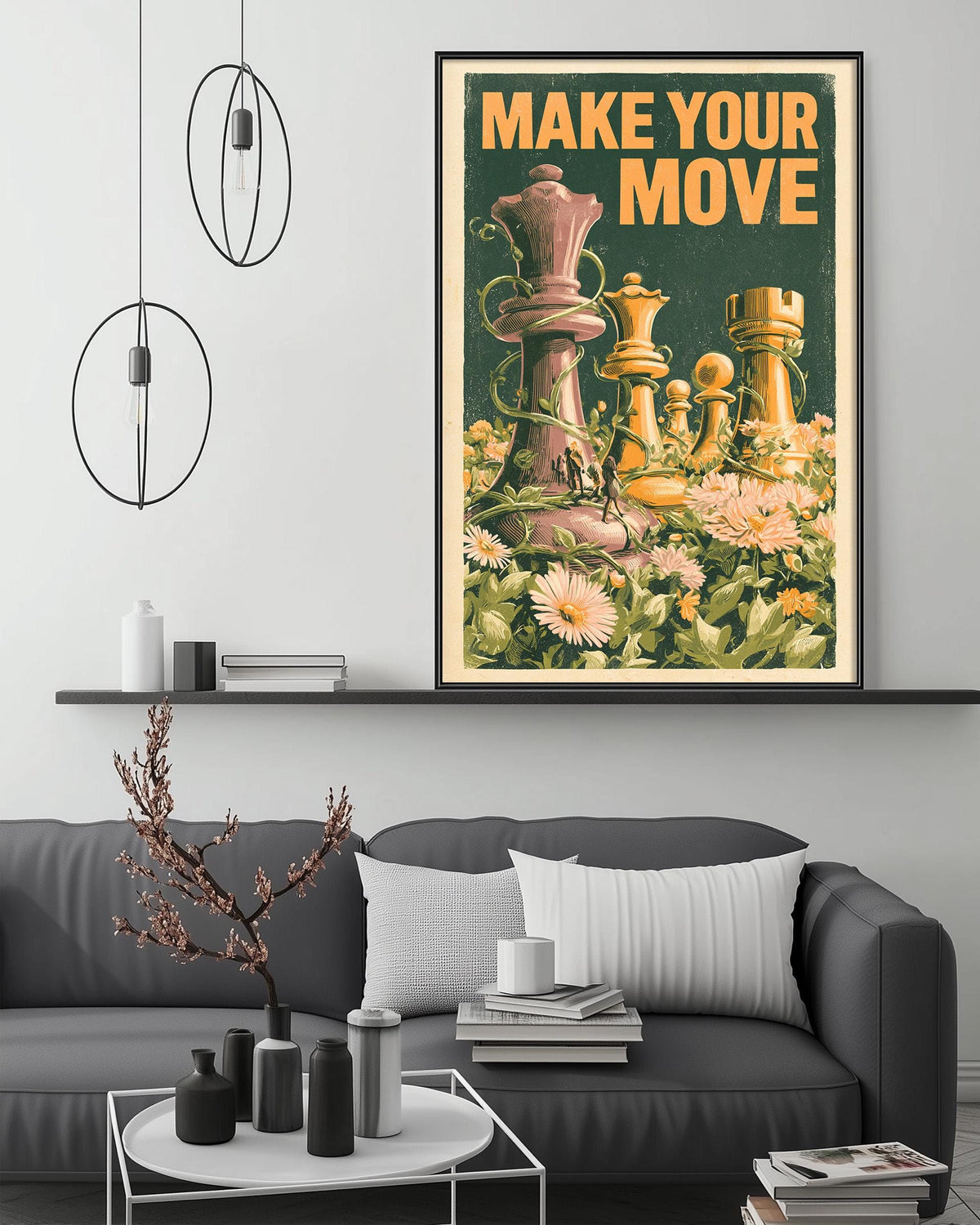 a framed poster with a chessboard and pieces, hanging on a wall above a gray couch in a living room setting.